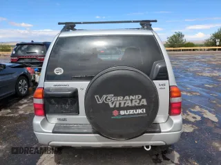 2003 Suzuki Grand Vitara z VIN JS3TD62V434104082, wystawiony jako Copart lot #57349105 z przebiegiem Nie podano mil oraz Szkoda całkowita • Salvage title. Historia ofert i sprzedaży dostępna na DreamBid. Obrazek 6.