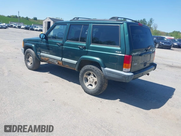 2000 Jeep Cherokee z VIN 1J4FF48S2YL253251, wystawiony jako IAAI lot #42243268 z przebiegiem 154 136 mil mil oraz . Historia ofert i sprzedaży dostępna na DreamBid. Obrazek 3.