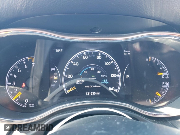 2014 Jeep Grand Cherokee Laredo with VIN 1C4RJEAGXEC217249, listed as a Copart auction lot 48585195 with 131,635 mi miles and Salvage Title. Bid and sale history available at DreamBid. Image 9.