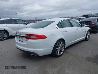 2015 Jaguar XF V6 Portfolio with VIN SAJWA0F7XF8U88039, listed as a IAAI auction lot 41459904 with 83,927 mi miles. Bid and sale history available at carsss.com. Image 4.