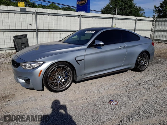 2015 BMW M4 with VIN WBS3R9C58FK334216, listed as a Copart auction lot 61497804 with 112,191 mi miles and Salvage Title. Bid and sale history available at carsss.com. Image 1.