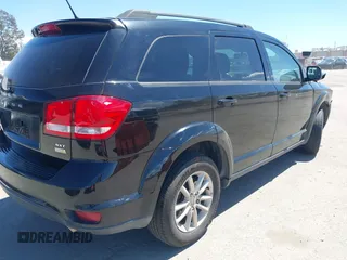 2017 Dodge Journey SXT with VIN 3C4PDCBG7HT518586, listed as a IAAI auction lot 41939533 with 128,154 mi miles and . Bid and sale history available at DreamBid. Image 4.