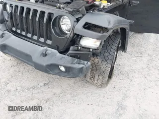 2021 Jeep Wrangler Unlimited Willys z VIN 1C4HJXDM5MW859724, wystawiony jako IAAI lot #42311203 z przebiegiem 71 887 mil mil oraz . Historia ofert i sprzedaży dostępna na DreamBid. Obrazek 6.