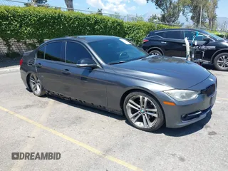 2014 BMW 3 Series 328d with VIN WBA3D3C51EK155031, listed as a IAAI auction lot 42149784 with 204,521 mi miles and . Bid and sale history available at carsss.com. Image 1.