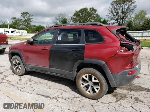 2014 Jeep Cherokee Trailhawk z VIN 1C4PJMBS2EW100476, wystawiony jako Copart lot #55130035 z przebiegiem 136 943 mil mil oraz Szkoda całkowita • Salvage title. Historia ofert i sprzedaży dostępna na DreamBid. Obrazek 2.