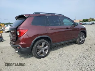 2019 Honda Passport Touring with VIN 5FNYF8H9XKB026631, listed as a Copart auction lot 61037545 with 54,041 mi miles and Salvage title. Bid and sale history available at DreamBid. Image 3.