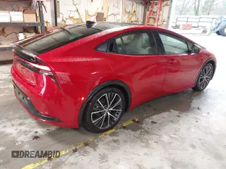 2024 Toyota Prius LE with VIN JTDACAAUXR3039886, listed as a IAAI auction lot 41928633 with 1,468 mi miles and . Bid and sale history available at DreamBid. Image 4.