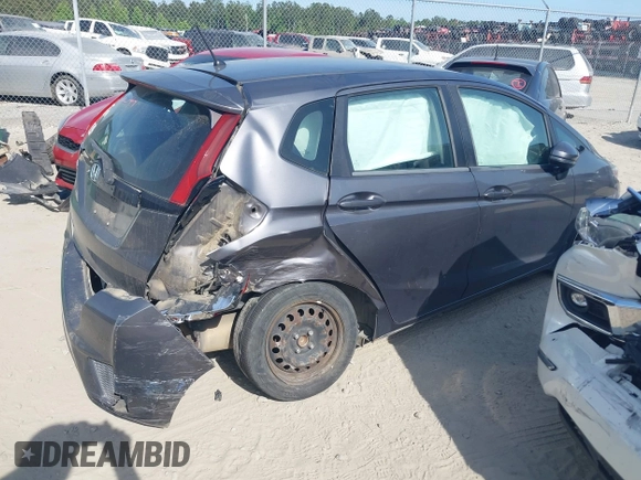 2015 Honda Fit LX with VIN 3HGGK5H52FM771511, listed as a IAAI auction lot 42132749 with 96,666 mi miles and . Bid and sale history available at DreamBid. Image 4.
