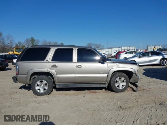 2003 Chevrolet Tahoe LS with VIN 1GNEK13Z03J294201, listed as a IAAI auction lot 41656836 with 302,922 mi miles. Bid and sale history available at carsss.com. Image 13.