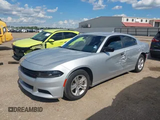 2023 Dodge Charger SXT with VIN 2C3CDXBG5PH529877, listed as a IAAI auction lot 42236262 with 45,887 mi miles and . Bid and sale history available at DreamBid. Image 17.