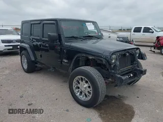 2008 Jeep Wrangler Unlimited Sahara z VIN 1J4GA59188L624010, wystawiony jako IAAI lot #42115574 z przebiegiem 105 800 mil mil oraz . Historia ofert i sprzedaży dostępna na DreamBid. Obrazek 1.