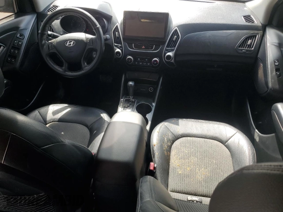 2010 Hyundai Tucson GLS with VIN KM8JU3AC2AU079129, listed as a Copart auction lot 54312875 with 116,659 mi miles and Salvage Title. Bid and sale history available at DreamBid. Image 8.
