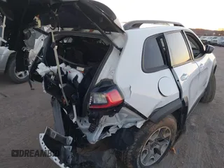 2021 Jeep Cherokee Trailhawk with VIN 1C4PJMBX4MD153086, listed as a IAAI auction lot 41132030 with 56,367 mi miles and . Bid and sale history available at DreamBid. Image 17.