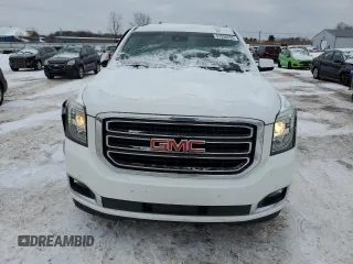 2020 GMC Yukon SLT with VIN 1GKS2BKC1LR280389, listed as a Copart auction lot 87928555 with 84,242 mi miles and Salvage Title. Bid and sale history available at carsss.com. Image 5.