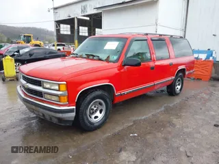 1999 Chevrolet Suburban with VIN 3GNEC16R7XG248641, listed as a IAAI auction lot 41964302 with 183,384 mi miles. Bid and sale history available at carsss.com. Image 2.
