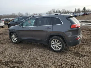 2015 Jeep Cherokee Limited with VIN 1C4PJLDB7FW701648, listed as a Copart auction lot 49612655 with 118,760 mi miles and Salvage Title. Bid and sale history available at DreamBid. Image 2.