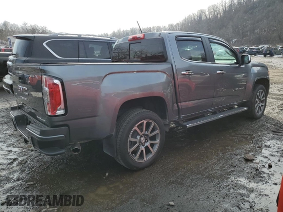 2022 GMC Canyon 4WD Denali with VIN 1GTG6EENXN1223923, listed as a Copart auction lot 46673415 with 30,495 mi miles and Salvage Title. Bid and sale history available at carsss.com. Image 3.