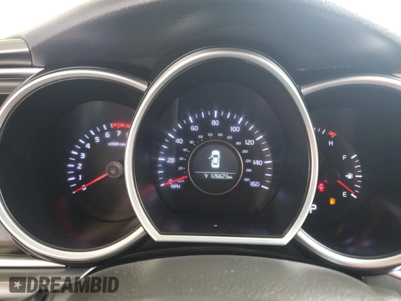 2015 Kia Optima LX with VIN KNAGM4A79F5604807, listed as a Copart auction lot 50052785 with 126,623 mi miles and Salvage Title. Bid and sale history available at DreamBid. Image 9.