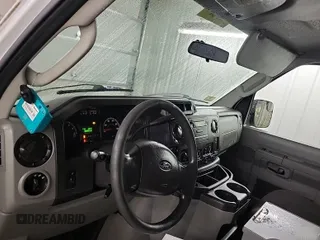2014 Ford Econoline Cargo Commercial with VIN 1FTNE2EL7EDB13739, listed as a IAAI auction lot 42231554 with 205,295 mi miles. Bid and sale history available at carsss.com. Image 1.