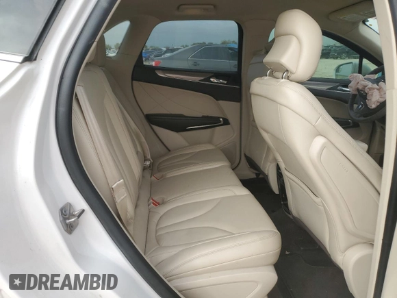 2019 Lincoln MKC Standard with VIN 5LMCJ1D95KUL45392, listed as a Copart auction lot 82561394 with 104,748 mi miles and Salvage Title. Bid and sale history available at DreamBid. Image 11.