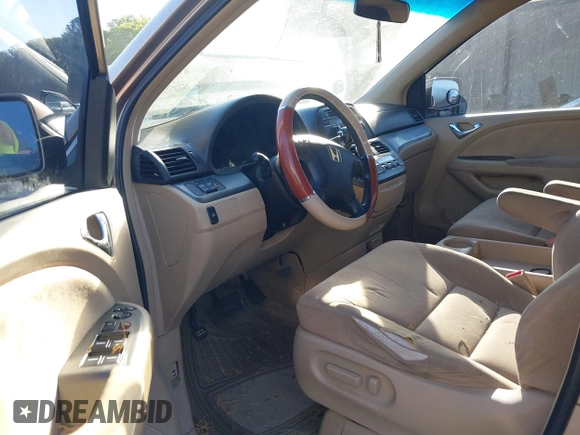 2006 Honda Odyssey EX with VIN 5FNRL38456B428213, listed as a IAAI auction lot 42036797 with 220,556 mi miles. Bid and sale history available at carsss.com. Image 5.