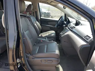 2014 Honda Odyssey Touring with VIN 5FNRL5H94EB079518, listed as a IAAI auction lot 42095098 with 141,019 mi miles and . Bid and sale history available at DreamBid. Image 5.