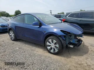 2024 Tesla Model Y Long Range z VIN 7SAYGDEE8RA248635, wystawiony jako Copart lot #59130125 z przebiegiem 21 210 mil mil oraz Szkoda całkowita • Salvage title. Historia ofert i sprzedaży dostępna na DreamBid. Obrazek 4.