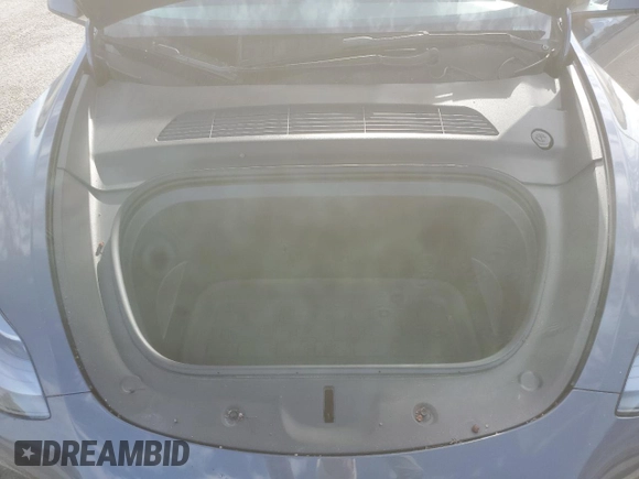 2022 Tesla Model Y Performance with VIN 7SAYGDEF3NF490643, listed as a Copart auction lot 46975825 with 50,792 mi miles and Salvage Title. Bid and sale history available at DreamBid. Image 12.