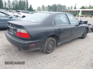 1997 Honda Accord LX z VIN 1HGCD5631VA242492, wystawiony jako IAAI lot #42442502 z przebiegiem 164 482 mil mil oraz . Historia ofert i sprzedaży dostępna na DreamBid. Obrazek 4.