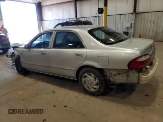 2000 Mazda 626 LX with VIN 1YVGF22C1Y5125842, listed as a Copart auction lot 45637895 with 84,487 mi miles and Salvage Title. Bid and sale history available at carsss.com. Image 2.
