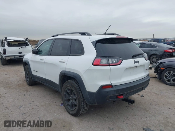 2019 Jeep Cherokee Trailhawk with VIN 1C4PJMBN6KD124023, listed as a IAAI auction lot 41432217 with 76,934 mi miles and . Bid and sale history available at DreamBid. Image 3.