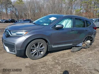 2021 Honda CR-V Touring with VIN 2HKRW2H9XMH645901, listed as a IAAI auction lot 41870446 with 22,996 mi miles. Bid and sale history available at carsss.com. Image 20.