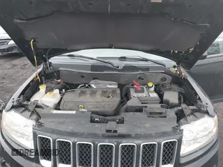 2013 Jeep Compass Latitude with VIN 1C4NJDEB3DD221904, listed as a IAAI auction lot 41691631 with 134,683 mi miles. Bid and sale history available at carsss.com. Image 10.