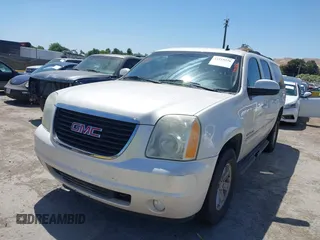 2012 GMC Yukon XL SLT z VIN 1GKS2LE74CR100438, wystawiony jako IAAI lot #42319226 z przebiegiem 172 628 mil mil oraz . Historia ofert i sprzedaży dostępna na DreamBid. Obrazek 6.