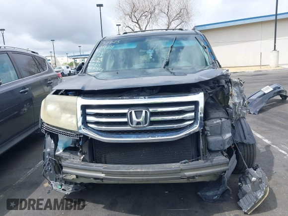 2012 Honda Pilot Touring with VIN 5FNYF3H9XCB008456, listed as a IAAI auction lot 41923004 with Not Provided miles and . Bid and sale history available at DreamBid. Image 13.