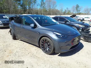2022 Tesla Model Y Performance with VIN 7SAYGDEF9NF544205, listed as a IAAI auction lot 41825453 with 33,039 mi miles and . Bid and sale history available at DreamBid. Image 1.
