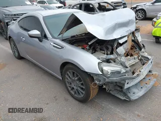 2015 Subaru BRZ Limited with VIN JF1ZCAC11F9606443, listed as a IAAI auction lot 41798257 with 105,465 mi miles. Bid and sale history available at carsss.com. Image 1.