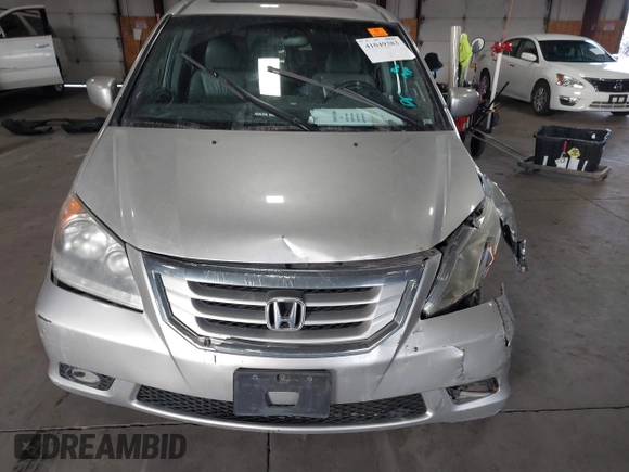 2009 Honda Odyssey Touring с VIN 5FNRL38979B005813, выставлен на аукционе IAAI как лот 41049383 с пробегом 174 897 миль миль и . История ставок и продаж доступна на DreamBid. Изображение 12.