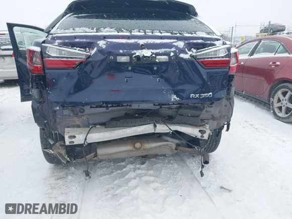 2017 Lexus RX with VIN 2T2BZMCA0HC104477, listed as a IAAI auction lot 41304849 with 98,888 mi miles. Bid and sale history available at carsss.com. Image 6.