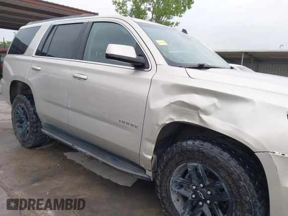 2015 Chevrolet Tahoe LT with VIN 1GNSKBKC3FR192693, listed as a IAAI auction lot 42142810 with Not provided miles and . Bid and sale history available at DreamBid. Image 21.