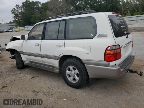 2000 Toyota Land Cruiser with VIN JT3HT05J9Y0101498, listed as a Copart auction lot 76126734 with 173,138 mi miles and Salvage Title. Bid and sale history available at carsss.com. Image 2.