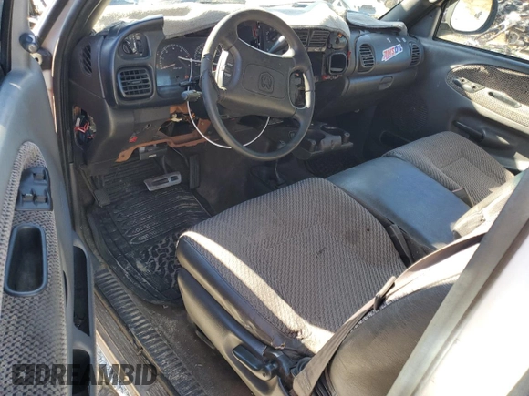 1999 Dodge 2500 with VIN 1B7KF23Z6XJ558288, listed as a Copart auction lot 86252004 with 251,023 mi miles and Salvage title. Bid and sale history available at DreamBid. Image 8.
