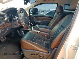 2016 Nissan Titan Platinum Reserve with VIN 1N6BA1F48GN515859, listed as a Copart auction lot 61955385 with 80,858 mi miles and Clean title. Bid and sale history available at DreamBid. Image 7.