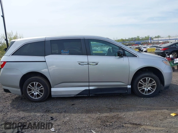 2011 Honda Odyssey EX-L with VIN 5FNRL5H61BB067456, listed as a IAAI auction lot 42131999 with 150,358 mi miles and . Bid and sale history available at carsss.com. Image 13.