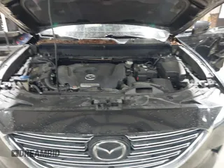 2016 Mazda CX-9 Signature z VIN JM3TCBEY5G0111286, wystawiony jako IAAI lot #42018161 z przebiegiem 155 920 mil mil oraz . Historia ofert i sprzedaży dostępna na DreamBid. Obrazek 10.