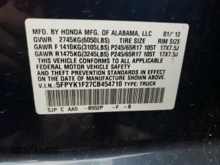 2012 Honda Ridgeline RT with VIN 5FPYK1F27CB454710, listed as a Copart auction lot 57634595 with 168,131 mi miles and Salvage title. Bid and sale history available at DreamBid. Image 12.