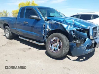 2005 Dodge Dakota SLT with VIN 1D7HE42N75S119489, listed as a IAAI auction lot 42115877 with 209,881 mi miles and . Bid and sale history available at DreamBid. Image 1.