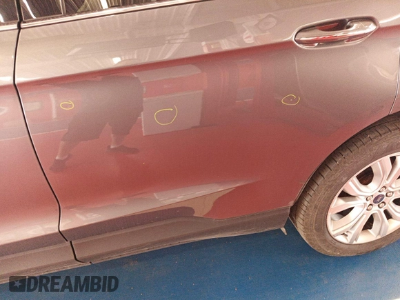 2021 Ford Edge Titanium with VIN 2FMPK4K95MBA50355, listed as a IAAI auction lot 42821253 with 109,191 mi miles and . Bid and sale history available at DreamBid. Image 16.