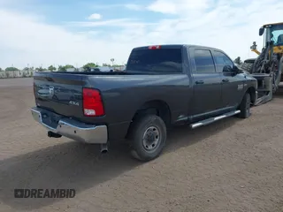 2018 Ram 2500 Tradesman with VIN 3C6UR5CJ7JG117166, listed as a IAAI auction lot 41865140 with 174,607 mi miles and . Bid and sale history available at DreamBid. Image 4.