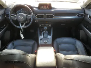 2019 Mazda CX-5 Grand Touring with VIN JM3KFBDM0K0571806, listed as a Copart auction lot 43395105 with 57,768 mi miles and Salvage Title. Bid and sale history available at carsss.com. Image 8.